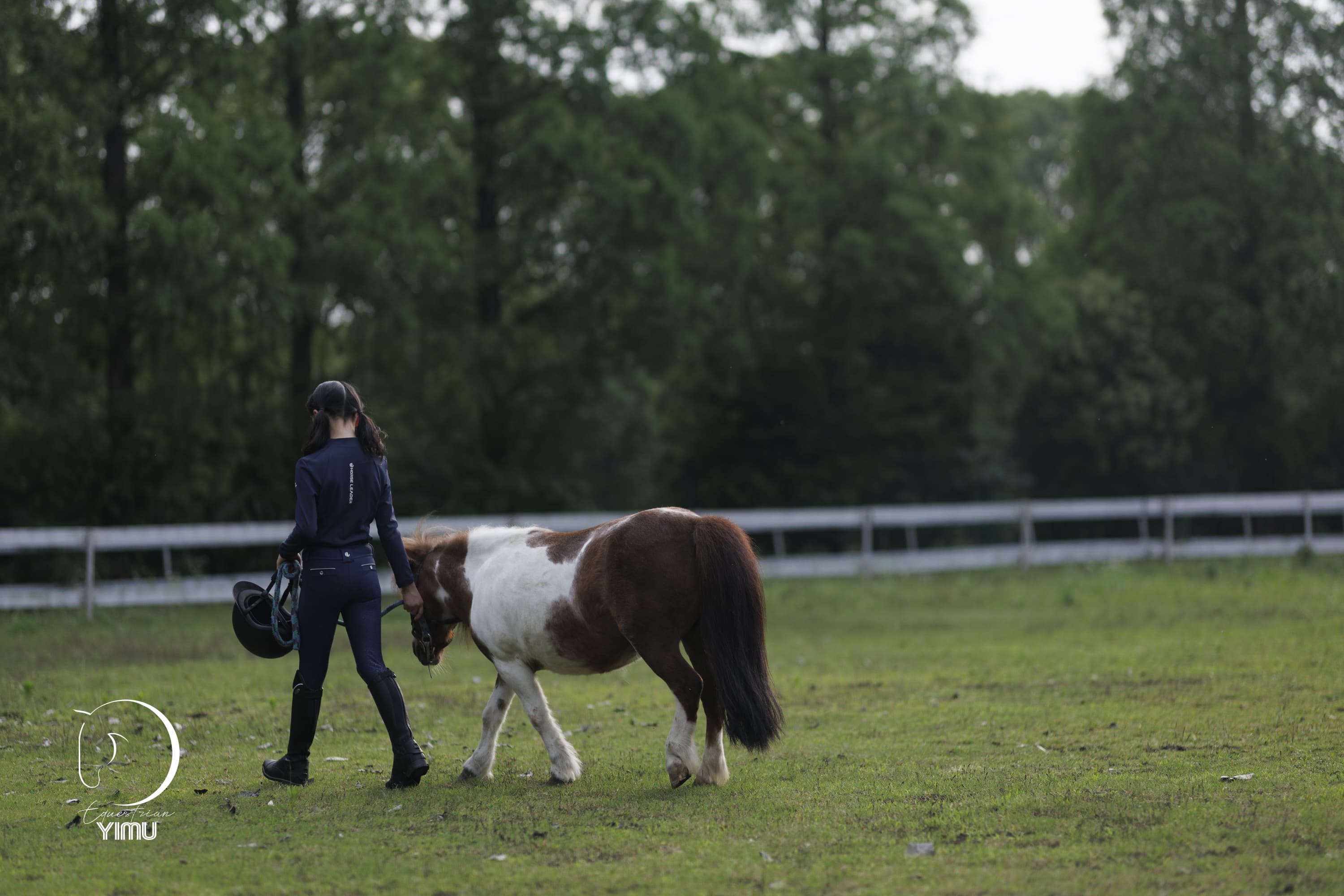 Brand story visual of a girl walking with her pony